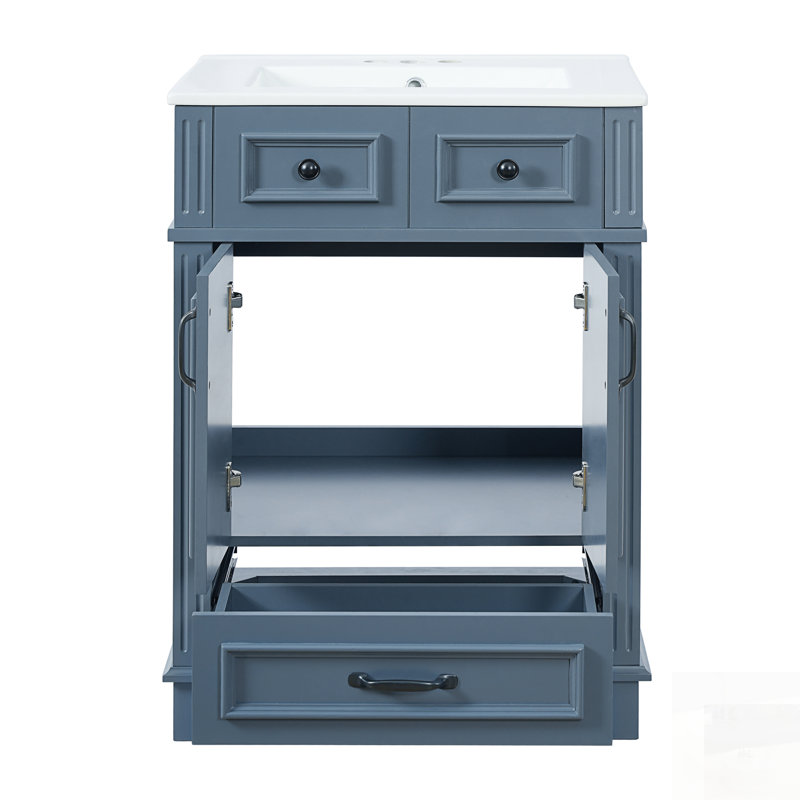 Meuble-lavabo de salle de bain avec lavabo en céramique, structure en bois massif, portes à fermeture douce, style rétro en bleu pour un rangement élégant