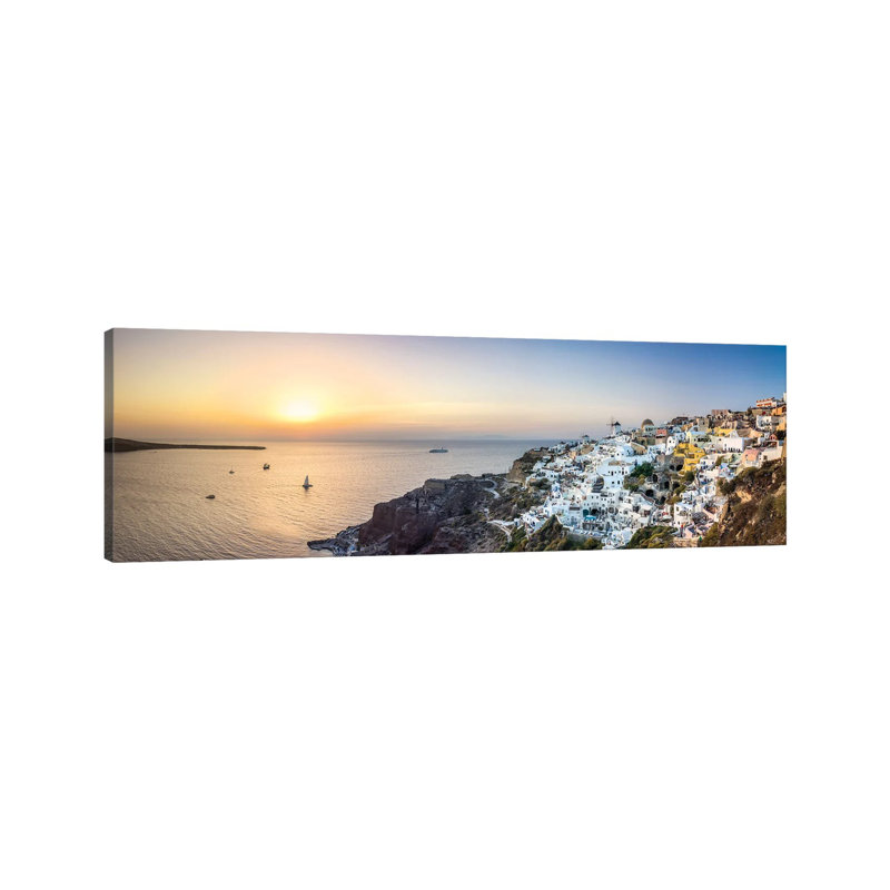 Panoramic Sunset View Of Oia And The Caldera, Santorini, Greece by Jan Becke - Wrapped Canvas Panoramic Print
