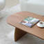 Table basse, piètement incurvé, surface lisse, noyer sélectionné, durabilité à long terme, support ovale en bois massif, répartition uniforme du poids, usage polyvalent-9752907