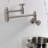 Kingston Brass Fuller Two-Handle 1-Hole Wall Mount Pot Filler Faucet-91118387