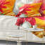 Coussin décoratif à imprimé floral rouge et jaune