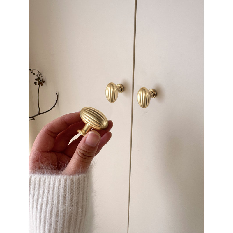 Forme ovale avec bouton rayé, Bronze champagne