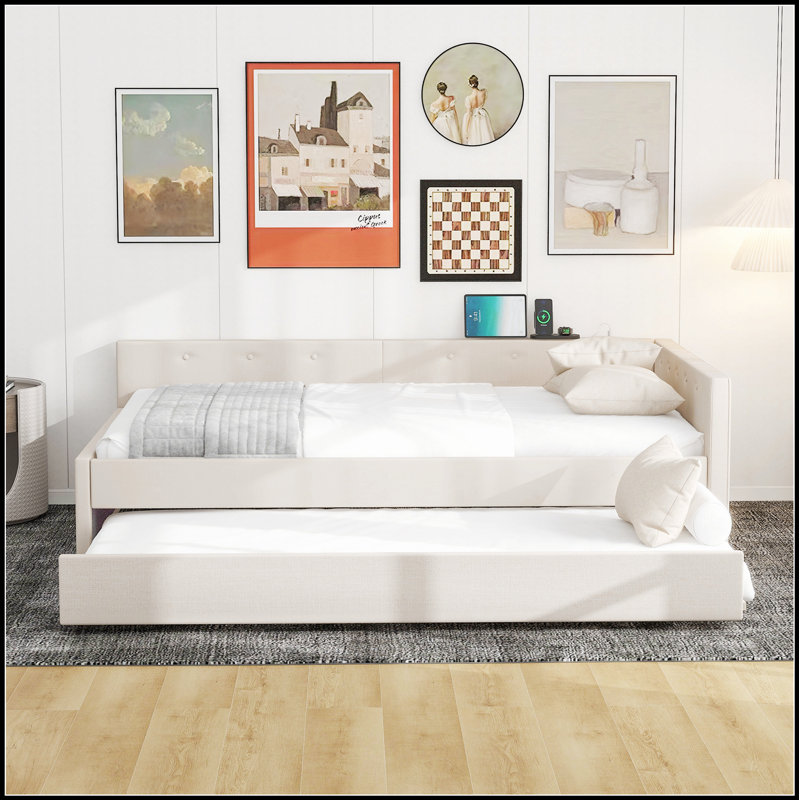Lit plateforme tapissier avec charge USB et lit gigogne pour un sommeil ou un rangement supplémentaire, alliant confort et commodité moderne.