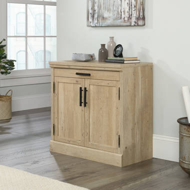 Colton 4 - Shelf Storage Cabinet Sand & Stable Finish: Rural Pine