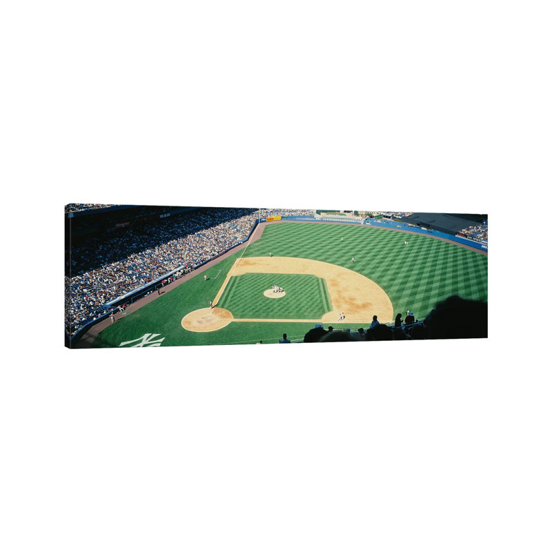 High Angle View Of Spectators Watching A Baseball Match In A Stadium, Yankee Stadium, New York City, New York State, USA by Panoramic Images - Wrapped Canvas Panoramic Gallery-Wrapped Canvas Giclée