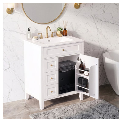 Meuble-lavabo simple 24 po avec lavabo en céramique, porte à fermeture douce et tablette de rangement ouverte de couleur blanche