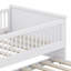 Lit plateforme en bois avec garde-corps et lit gigogne-313039927