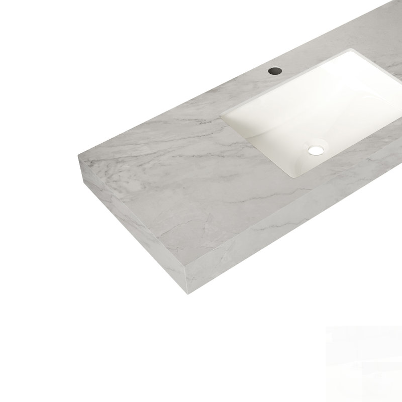 Plan de travail en pierre frittée veinée avec lavabo en céramique encastrée, alliant haute durabilité et esthétique moderne pour les meubles-lavabos de salle de bain contemporains.