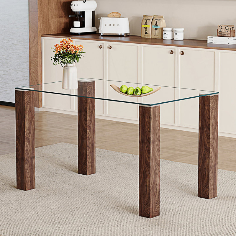 Table de salle à manger transparente en verre trempé avec pieds rectangulaires en grain de bois