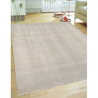 Tapis ivoire noué à la main