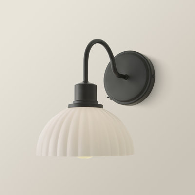 Akshayan Armed Sconce