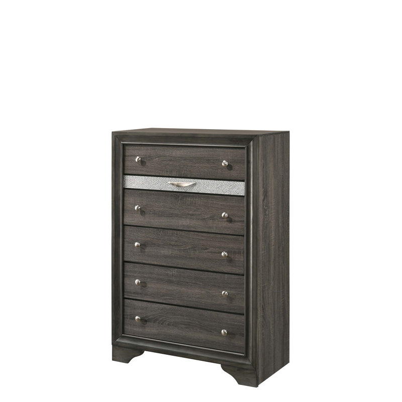 Commode à finition Naima avec cinq tiroirs et un organisateur de bijoux, conception moderne pour un rangement efficace et élégant.