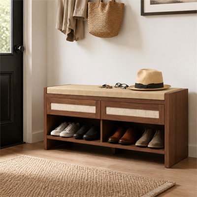 Brown shoe bench with upholstered seat two rattan drawers and open storage shelf