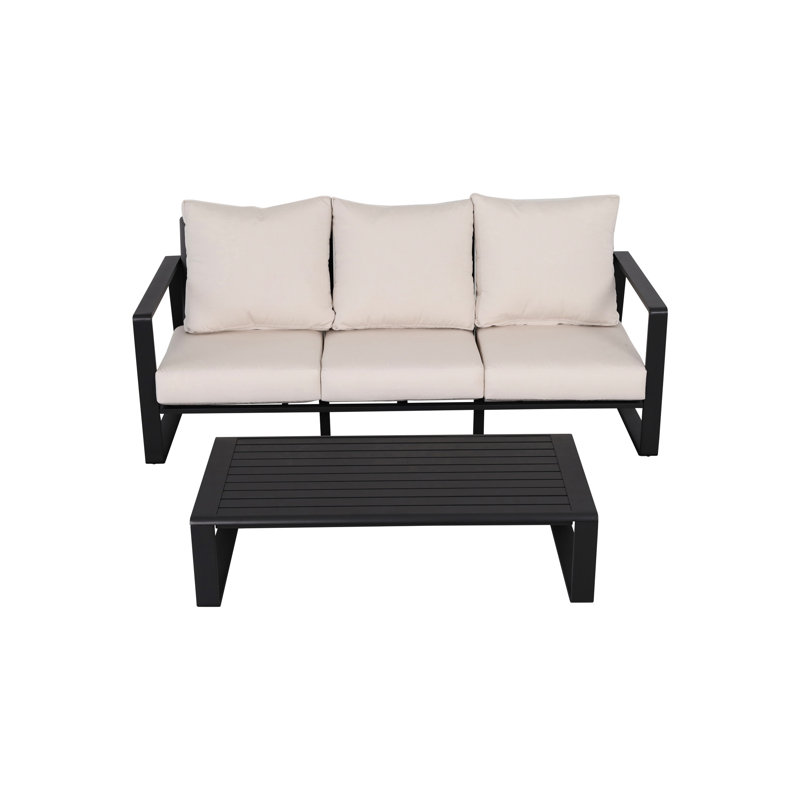 Trois avec table basse rectangulaire, coussin gris moelleux, fabrication moderne en aluminium et coussins, structure robuste