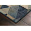 Tapis bleu à motif géométrique-22280860
