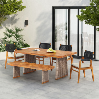 Ensemble repas d'extérieur 6 pièces en bois d'acacia avec pieds en rotin tissé à la main, parfait pour la terrasse et le jardin