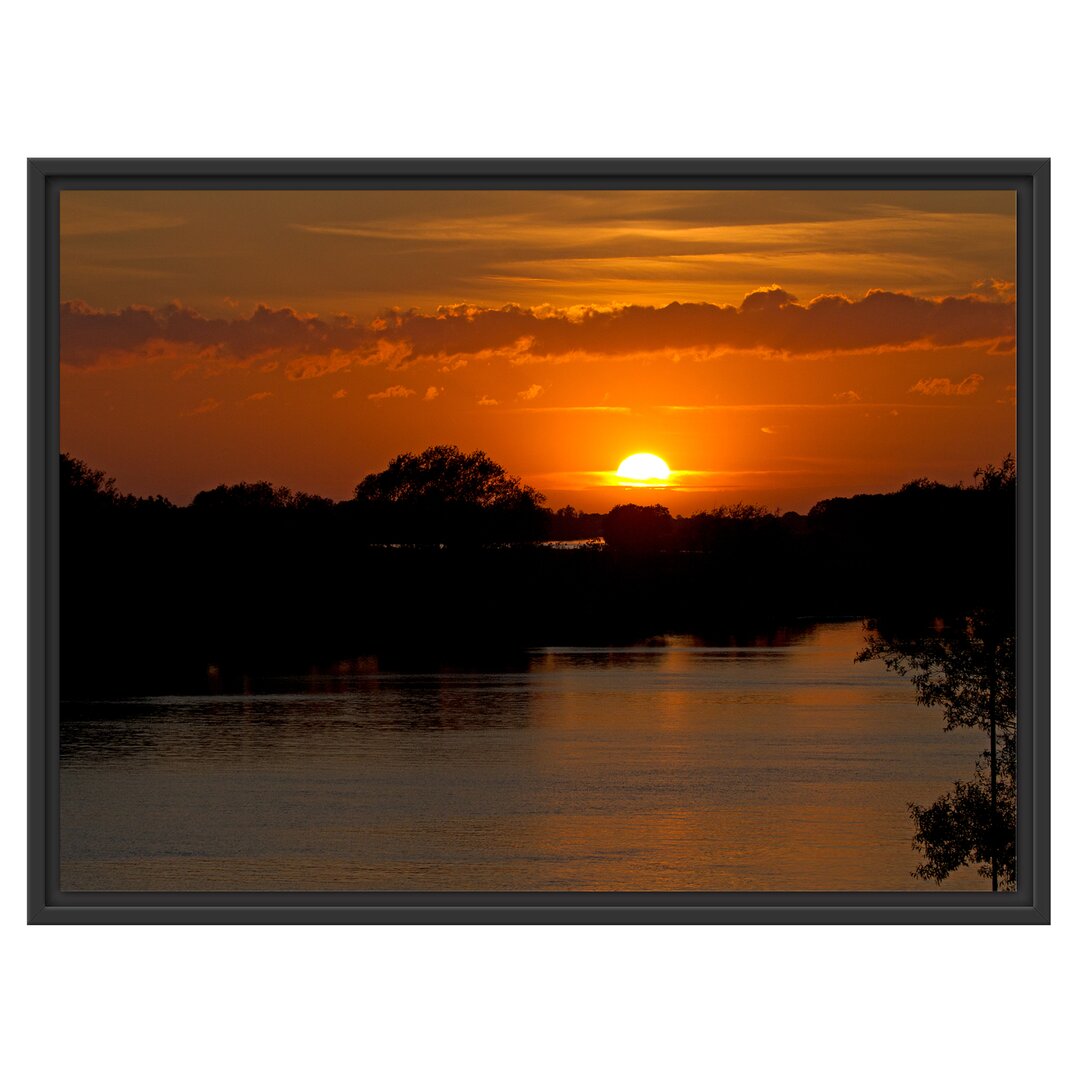 Gerahmtes Wandbild Sonnenuntergang über Fluss