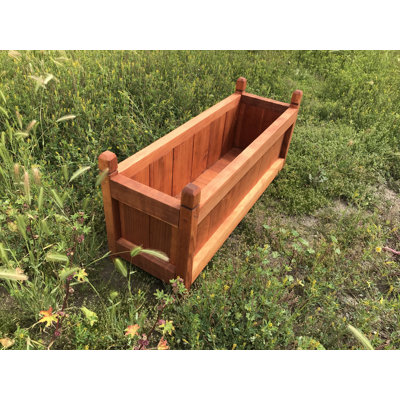 Pot à fleurs surélevé en bois