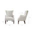 Fauteuil à oreilles capitonné Hannah