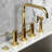 Kingston Brass Concord Two-Handle 4-Hole Deck Mount Bridge Kitchen Faucet with Brass Side Sprayer-102440343