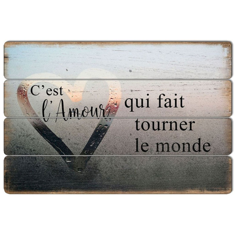 Enseigne «C'est L'amour Que Fait Tourner Le Monde»