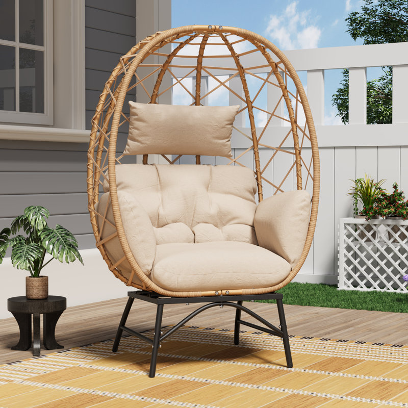 Fauteuil d'extérieur en osier avec coussin extensible Solvane, Beige