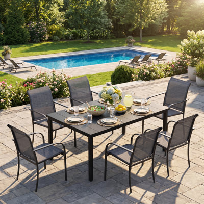 Leyre 6 - Person Patio Dining Set with Rectangular Table