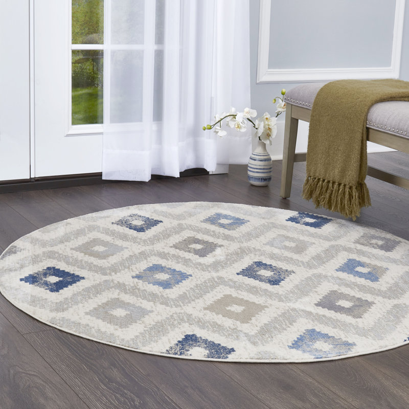 Tapis géométrique ivoire / bleu, Rond 5 pi 2 po