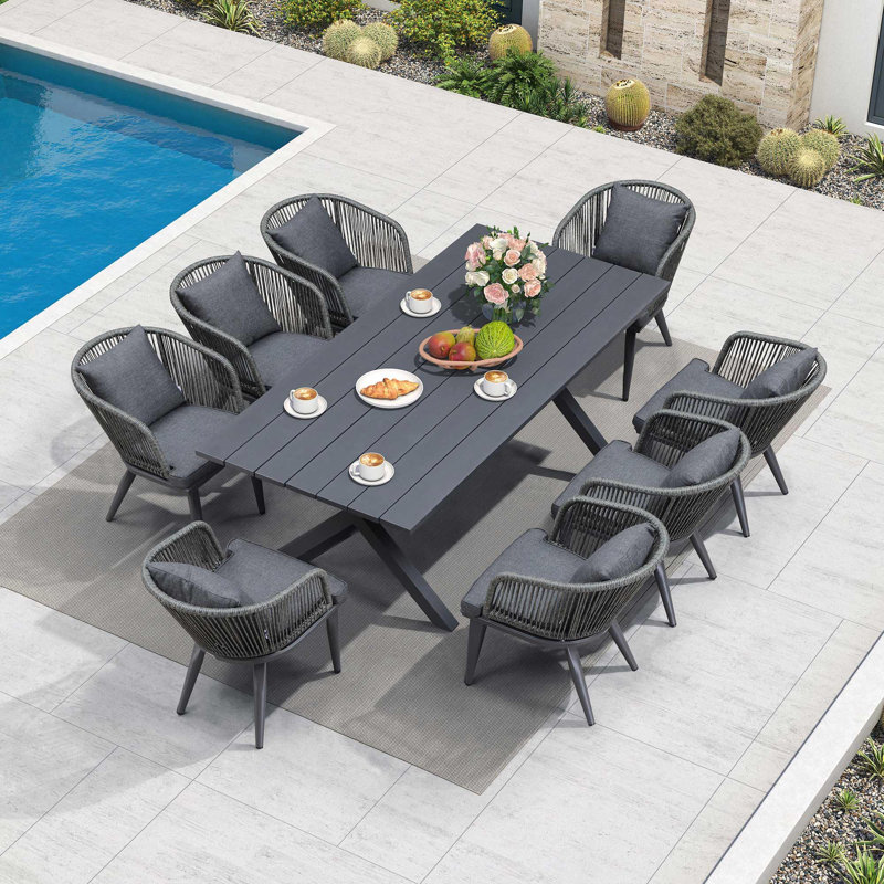 Purple Leaf 8 - Person Rectangular Outdoor Dining Set with Cushions and Pillows
