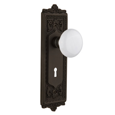 Egg & Dart Plate with Decorative Keyhole and White Porcelain Door Knob