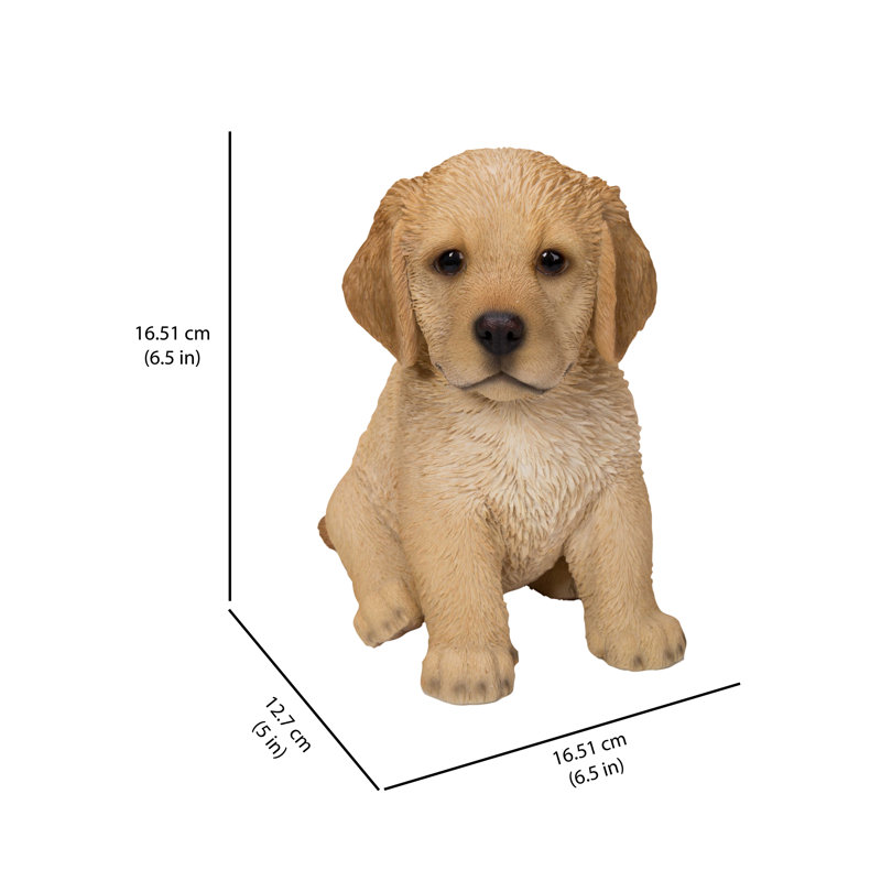 Statue retriever chiot assis