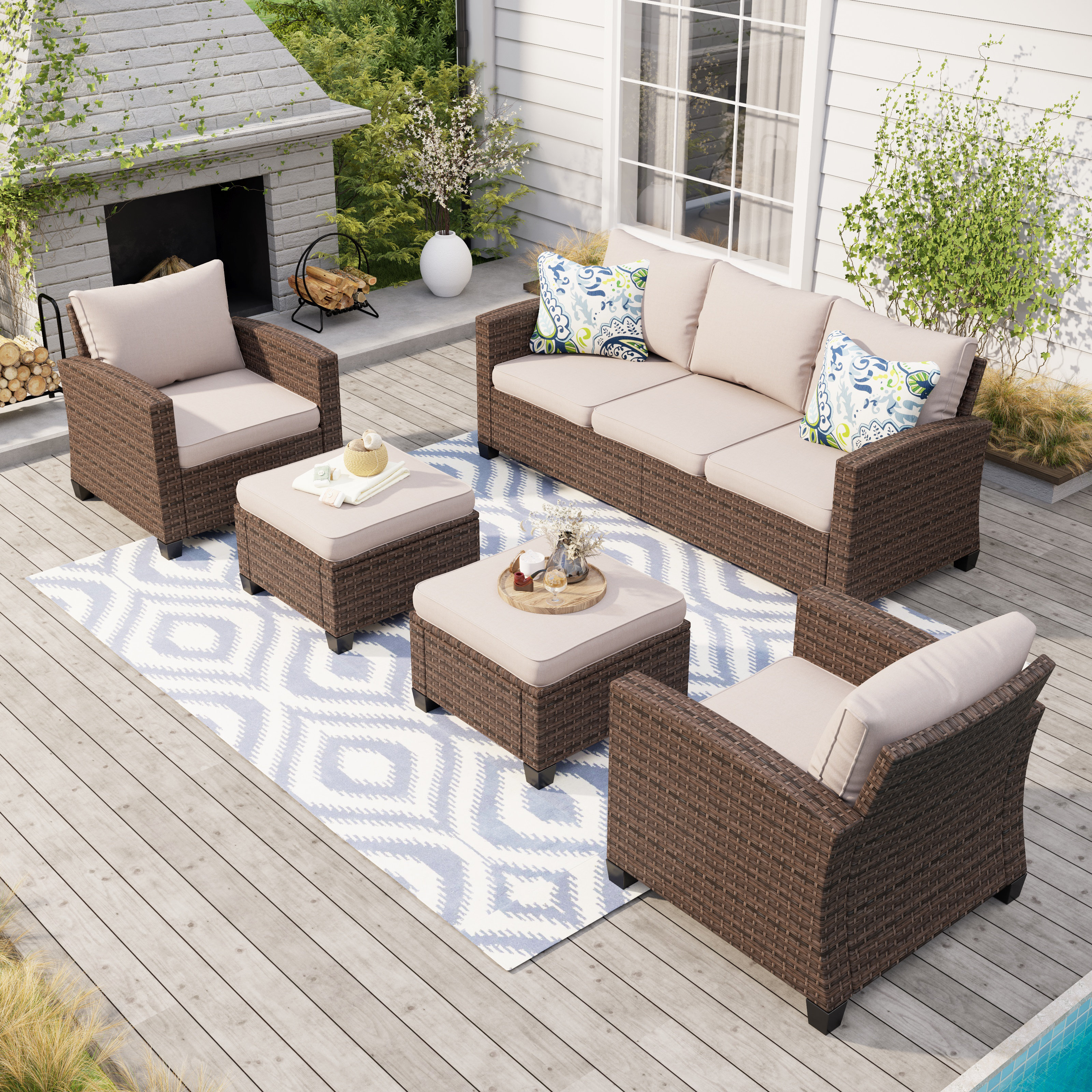 Argyri 7 - Person Outdoor Wicker Patio Conversation Furniture Set with Fire Pit Table