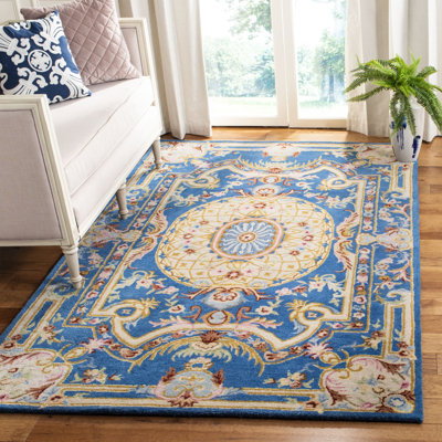 Tapis bleu / ivoire en laine touffeté à la main Priscila