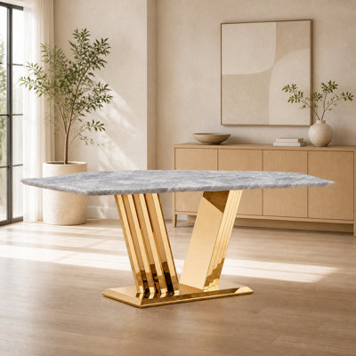  Table de salle à manger 70 pouces rectangulaire en faux marbre avec base sculpturale en acier inoxydable