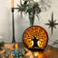 Lampe de table Rustic Tree of Life en métal noir avec lueur ambrée, accents brun rouille, hauteur de 8 pouces