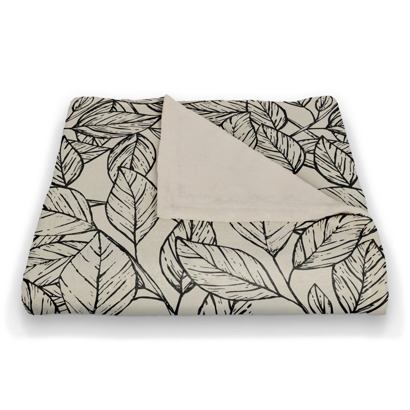Jeté en molleton à feuilles esquissées