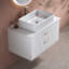 Meuble-lavabo moderne simple avec lavabo vasque en céramique et rangement spacieux, parfait pour les salles de bain contemporaines