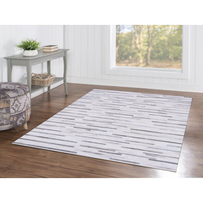 Jameown Patchwork Faux Cowhide Gray/Black Printed Area Rug