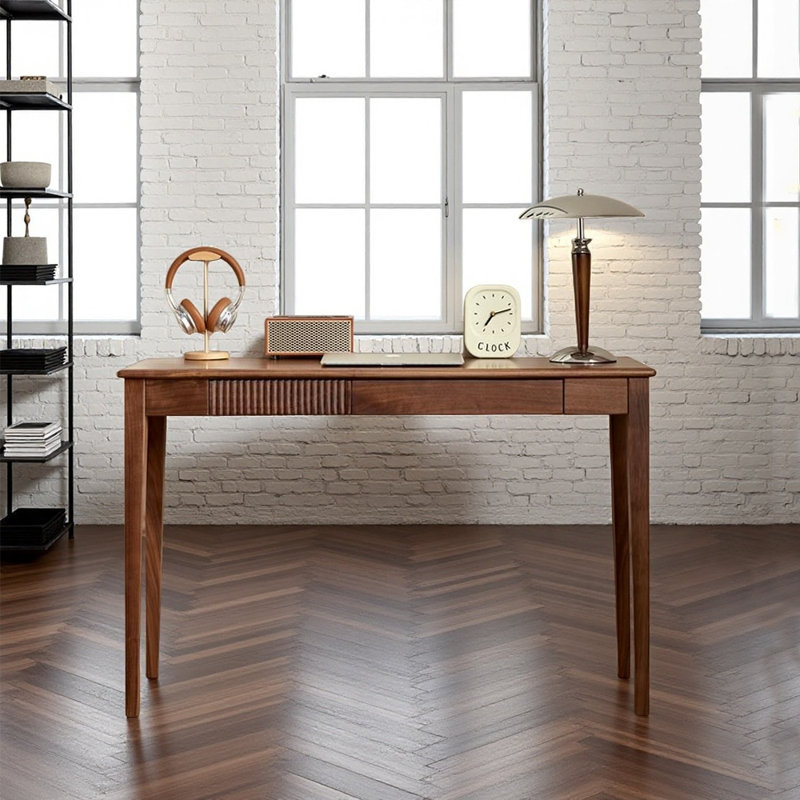 A simple desk,  29.53" H x 39.37" W x 15.75" D