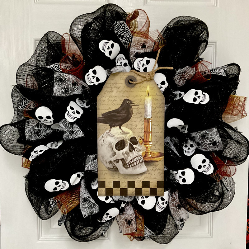 Couronne d'Halloween, crâne de corbeau et bougie