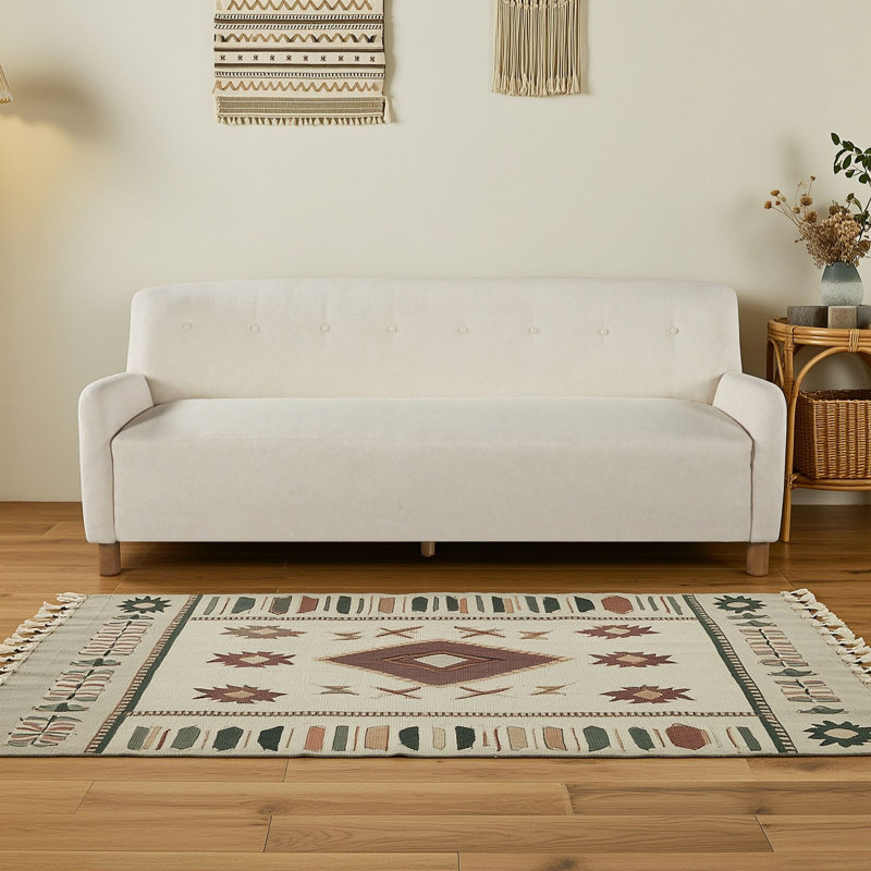 Canapé capitonné trois places, Beige