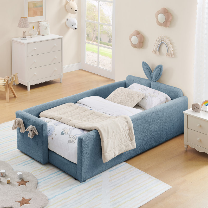 Lit plateforme tapissier simple avec tête de lit mignonne en forme d'oreille de lapin, avec barre de sécurité et poche, tissu bouclé