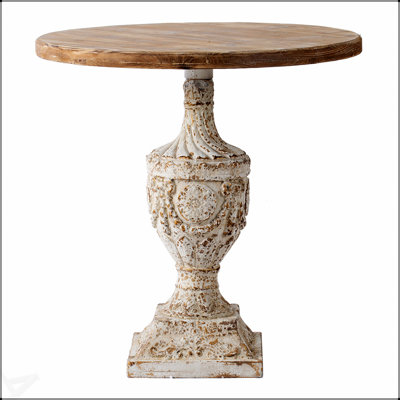 Antique Round Wood Table With Intricate Carvings And Durable Construction, Perfect For Adding Elegance To Any Interior Space.