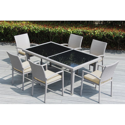 Ohana 6 - Person Wicker Patio Dining Set with Rectangular Table , Sunbrella® Cushions Included
