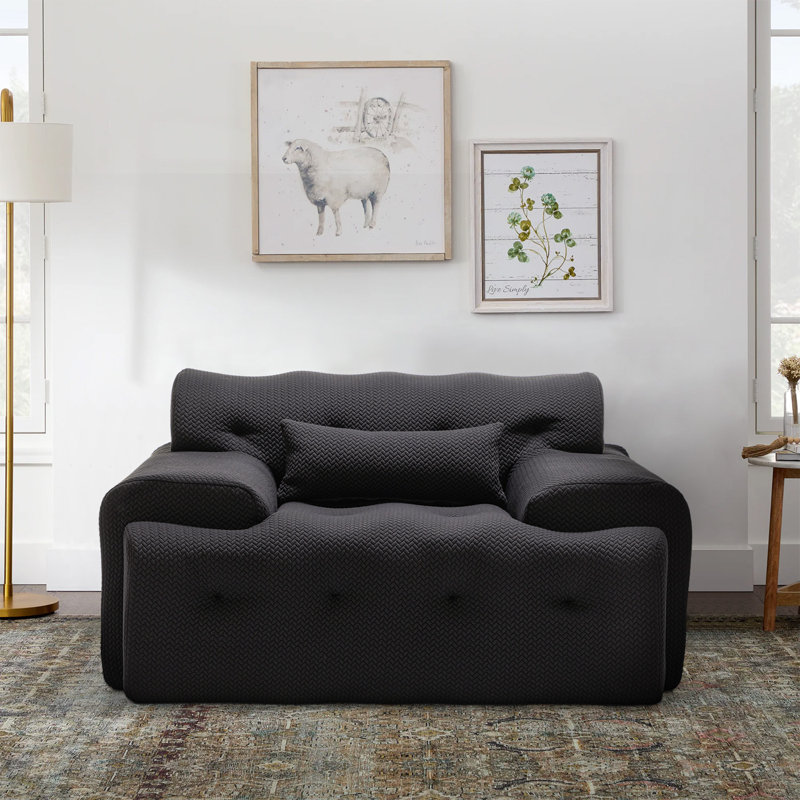 Fauteuil d'appoint surdimensionné et capitonné Kapedes, Polyester noir
