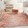 Coyst Damask Orange/White Area Rug