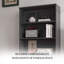 Bibliothèque en rotin avec porte d'armoire noire