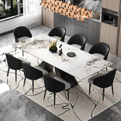 Ensemble de table de salle à manger moderne avec plateau en faux marbre extensible de 94,5 po et 8 chaises de salle à manger en similicuir