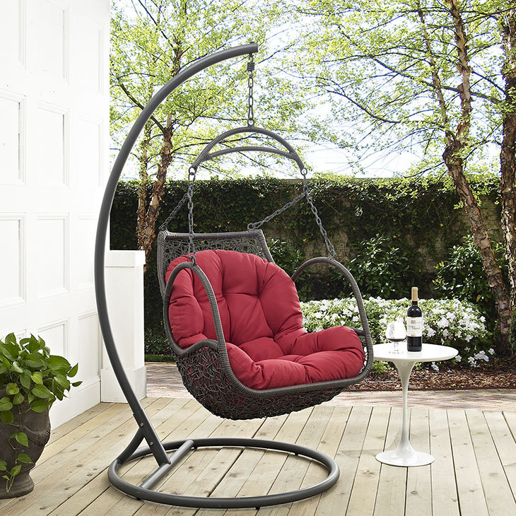 Gray Wicker Hanging Chair with Red Cushions and Steel Frame