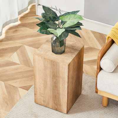 Rehaussez votre espace de vie avec cette table basse en MDF moderne qui met en valeur des motifs de texture de couleur bois clair et doux. Il est caractérisé par un design élégant. 12 * 12 * 19,6
